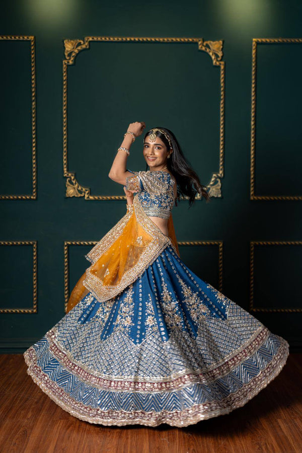 Blue Hand Embroidered Lehenga Set In Raw Silk With Mango Yellow Organza Dupatta.